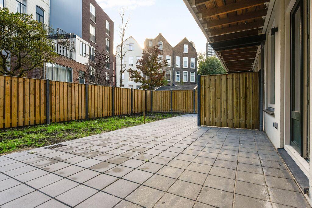 Achtergevel en tuin woongebouw KoBra